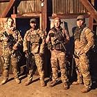 Jon Helgren acting as the productions military advisor with principle and supporting cast for the feature film "This Shall Pass"