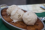 A cookie dessert, topped with ice cream