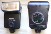 Front and back views of a Minolta Auto 28 electronic flashlamp ca 1978