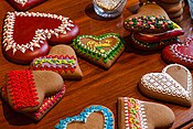 Hearts shaped Valentine's Day cookies adorned with icing