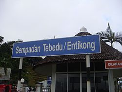 Malaysia-Indonesia border sign in Tebedu