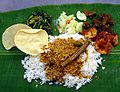 Image 76A typical serving of banana leaf rice. (from Malaysian cuisine)