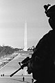Image 38Photograph of a National Guardsman looking over the Washington Monument in Washington D.C., on January 21, 2021, the day after the inauguration of Joe Biden as the 46th president of the United States (from Photojournalism)