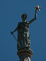 Goddess of Liberty statue atop the building