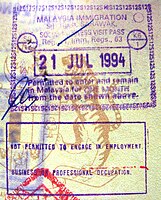 Malaysian entry stamp from its checkpoint.