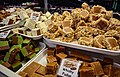 Fudge is a type of sugar candy that is made by mixing and heating sugar, butter and milk.