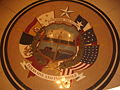Terrazzo mosaic of reverse seal of Texas in the capitol extension, showing the six flags of Texas