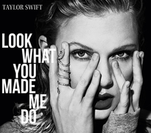 Cover art of "Look What You Made Me Do", a black-and-white photo of Taylor Swift covering her face with her hands, leaving the eyes staring