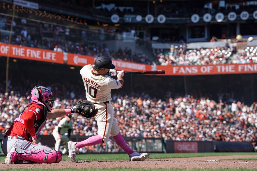 SAN FRANCISCO, CALIFORNIA - MAY 12: Casey Schmitt #10 of the San Francisco Giants hits a game-winning double against the Cincinnati Reds in the bottom of the tenth inning at Oracle Park on May 12, 2024 in San Francisco, California. (Photo by Kavin Mistry/Getty Images)