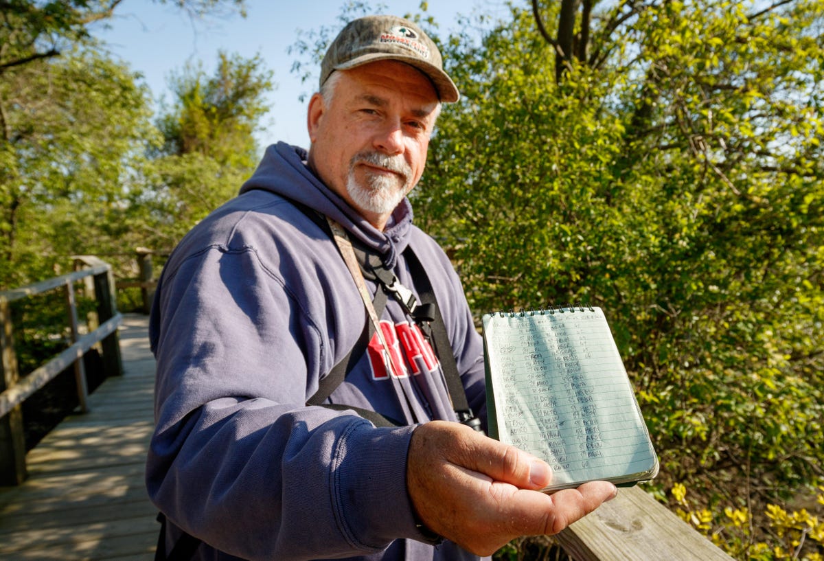 Connecticut birder Tim Thompson keeps track of birds in a notebook, but then logs the species on the eBird service so other birders can benefit from his sightings.
