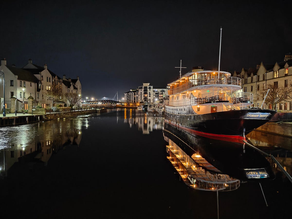 a photo of a boat at night