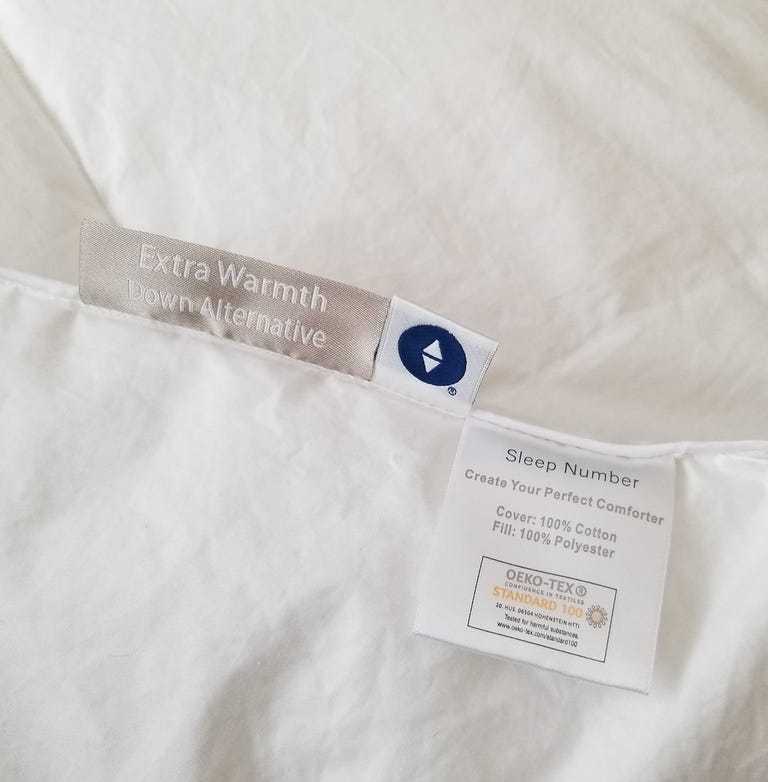 Close up of the tags on the Create Your Perfect Comforter from Sleep Number