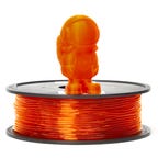 Orange roll of filament with an astronaut model on top