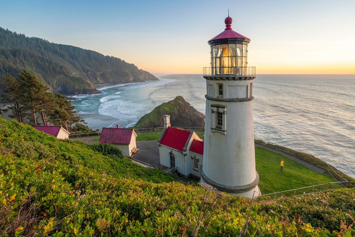 Heceta Head lighthouse at sunset, from an elevated point of view in Florence, Oregon.