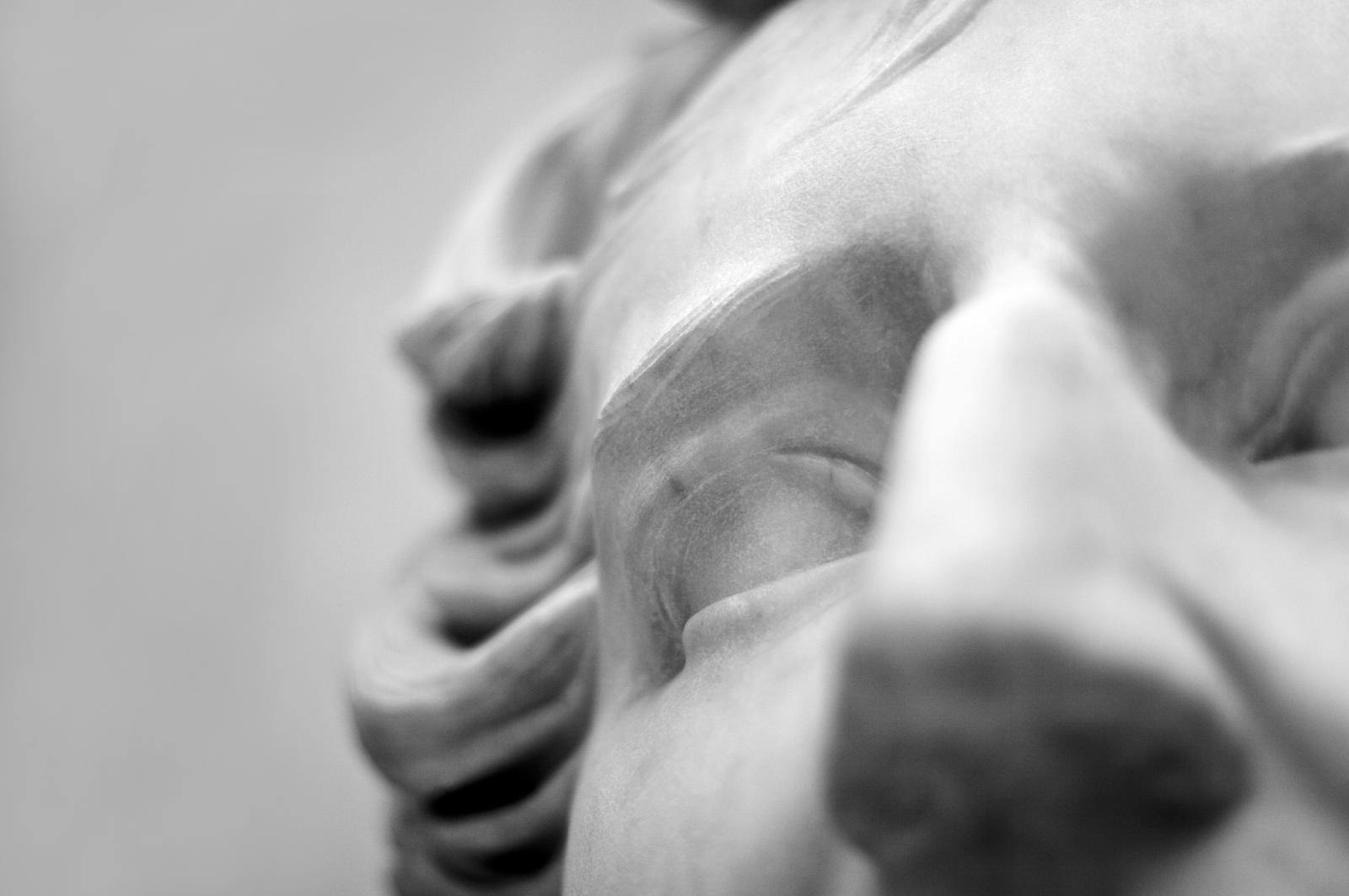 Close up of a head of a classical stone statue