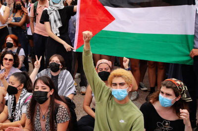 Austin, TX, USA - April 25, 2024: University of Texas students protest Israel's war in Gaza and the arrest of students at a demonstration the previous day at a rally on campus.