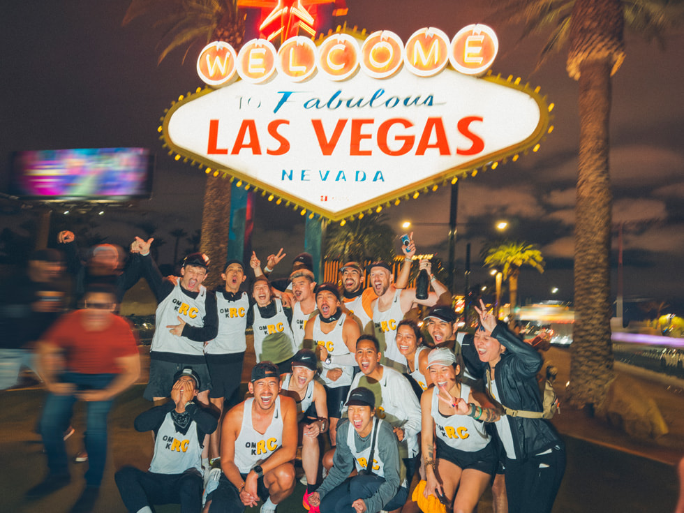 The team celebrates their arrival at the finish line in Las Vegas.
