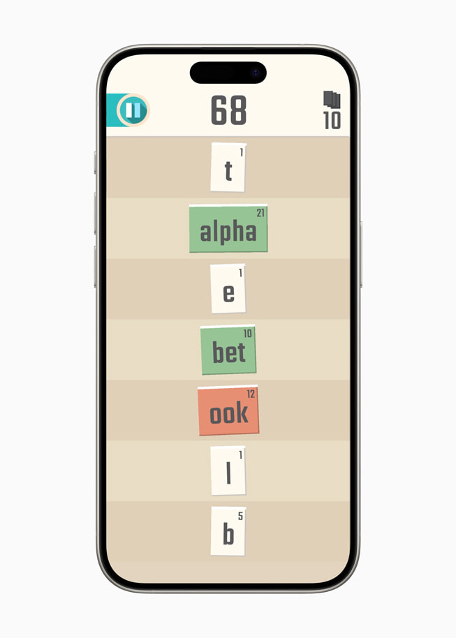 Fotos z gry Words in Progress wyświetlanej na iPhonie 15 Pro.