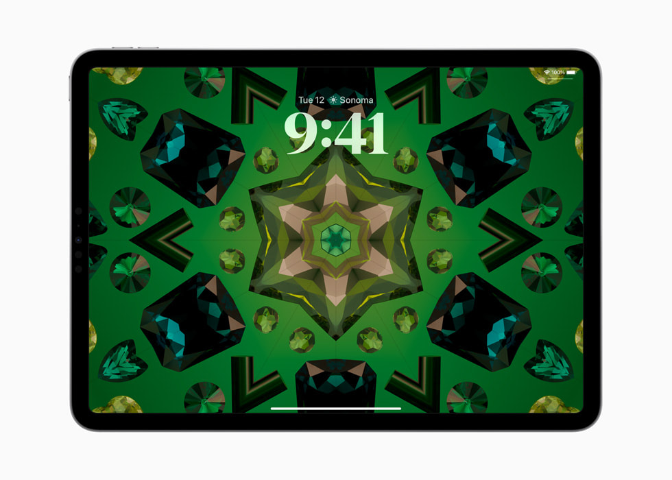 A Lock Screen with kaleidoscope wallpaper is shown on the 11-inch iPad Pro.