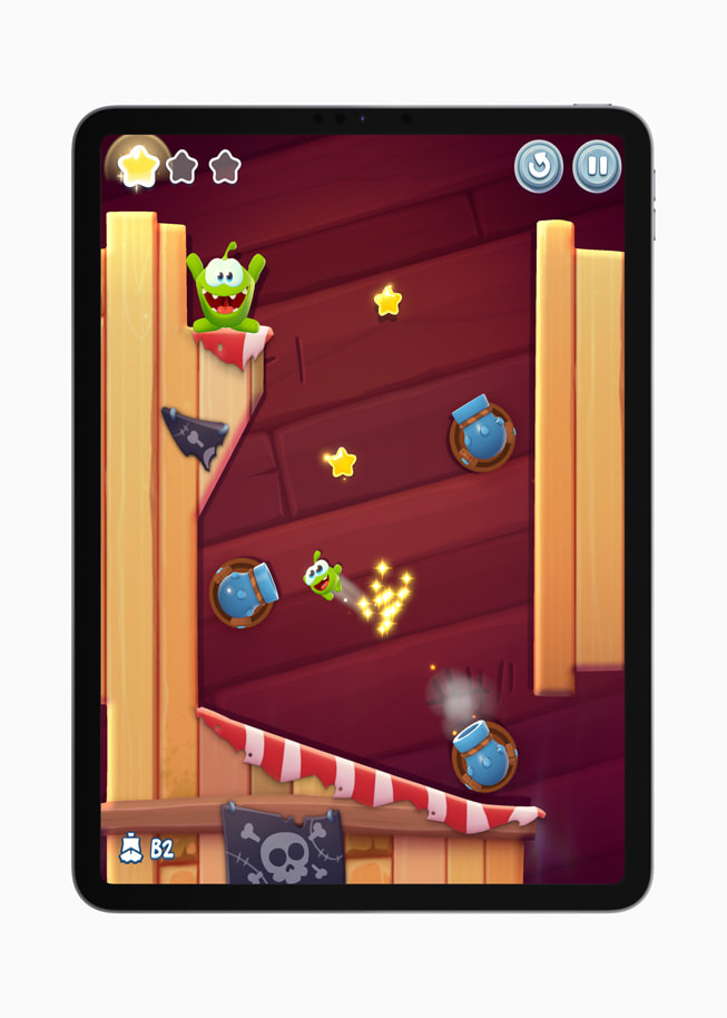 A still from the game Cut the Rope 3 is shown on iPad Pro (6th generation).