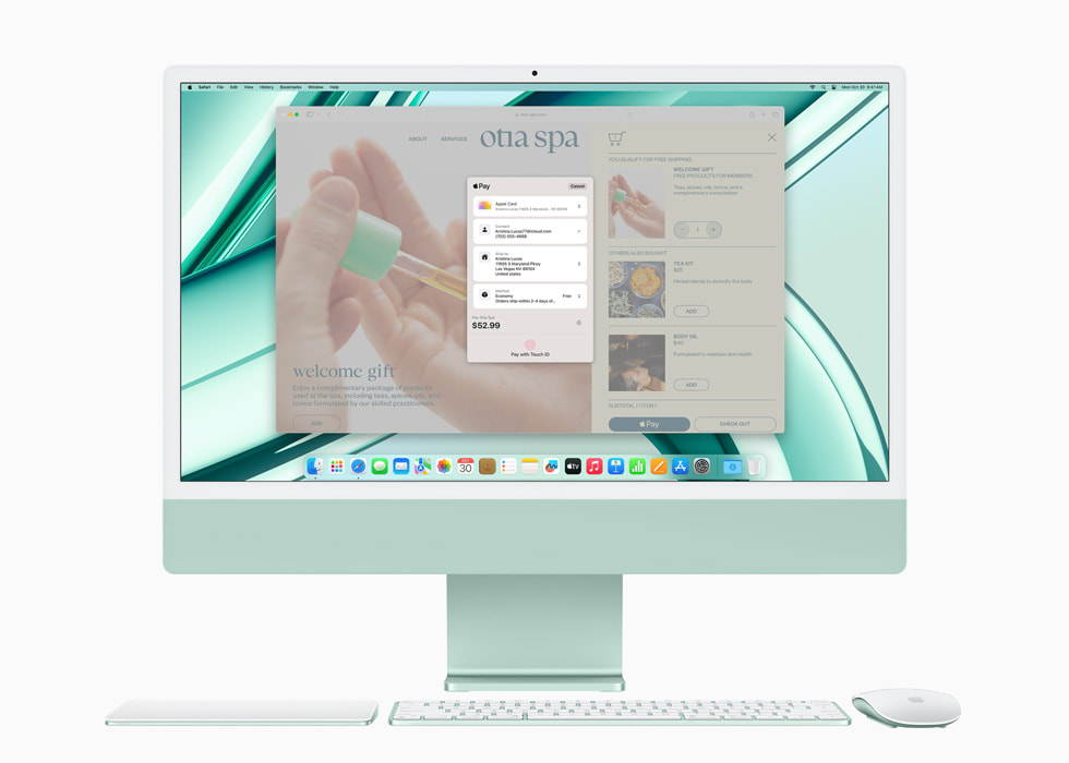 Apple Pay를 보여주는 M3 칩을 장착한 새로운 그린 색상의 iMac과 컬러 매칭 키보드 및 마우스.