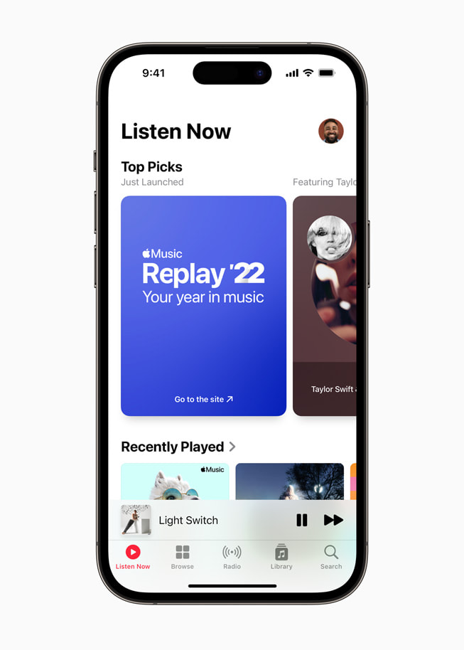 Apple Music’s redesigned Replay experience is shown.