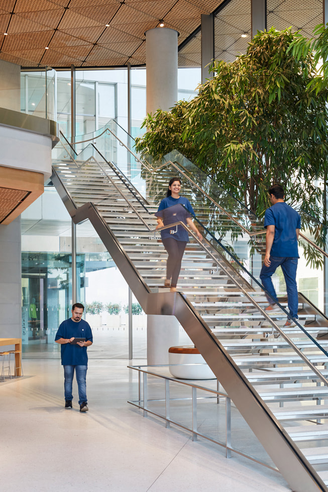 The stainless steel staircase is shown inside Apple BKC.