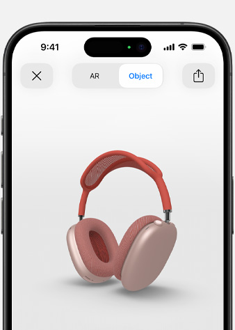 Afbeelding van roze AirPods Max in AR-scherm op iPhone.