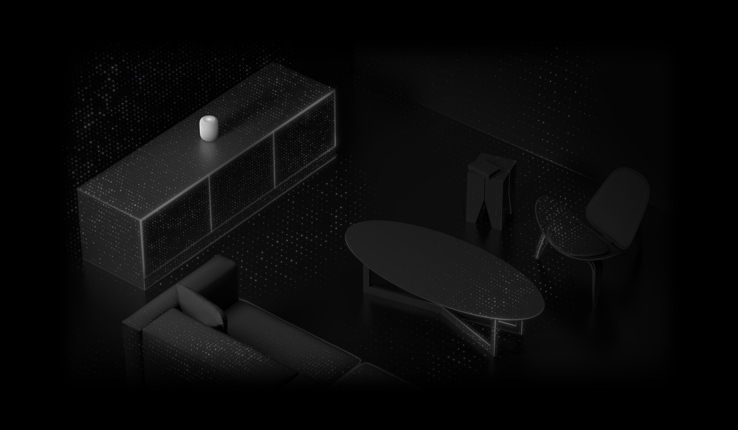 A visualisation of room sensing. HomePod is placed in a room on top of a console. Animated light particles representing sound emanate from HomePod, rippling out over other objects in the room — the sofa, coffee table, side table, and chair.