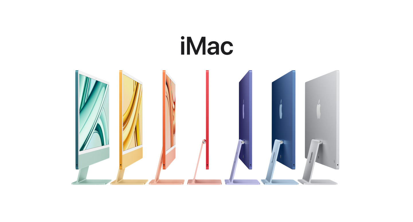 Computere iMac de 24 de inchi pe Verde, Galben, Portocaliu, Roz, Violet, Albastru și Argintiu, aliniate, cu logoul Apple pe spatele ecranului