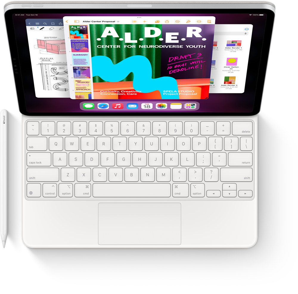 Vue de dessus de l’iPad Pro avec Magic Keyboard et Apple Pencil affichant l’app Keynote.