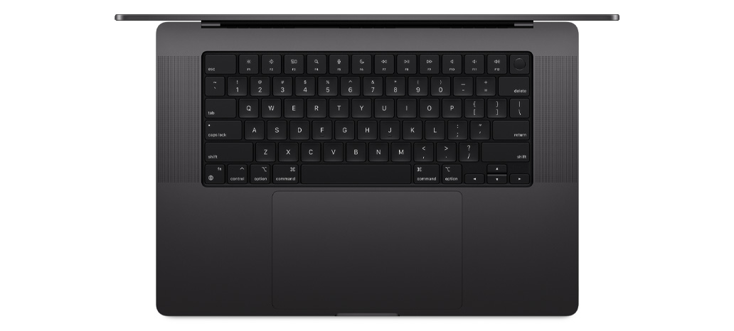 Pogled odozgo na MacBook Pro s naglaskom na ugrađenu tipkovnicu Magic Keyboard s Touch ID-jem i trackpadom