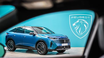 Présentation mondiale du nouveau véhicule Peugeot E-3008 100% électrique, à Montbéliard le 12 septembre 2023. (LIONEL VADAM  / MAXPPP)
