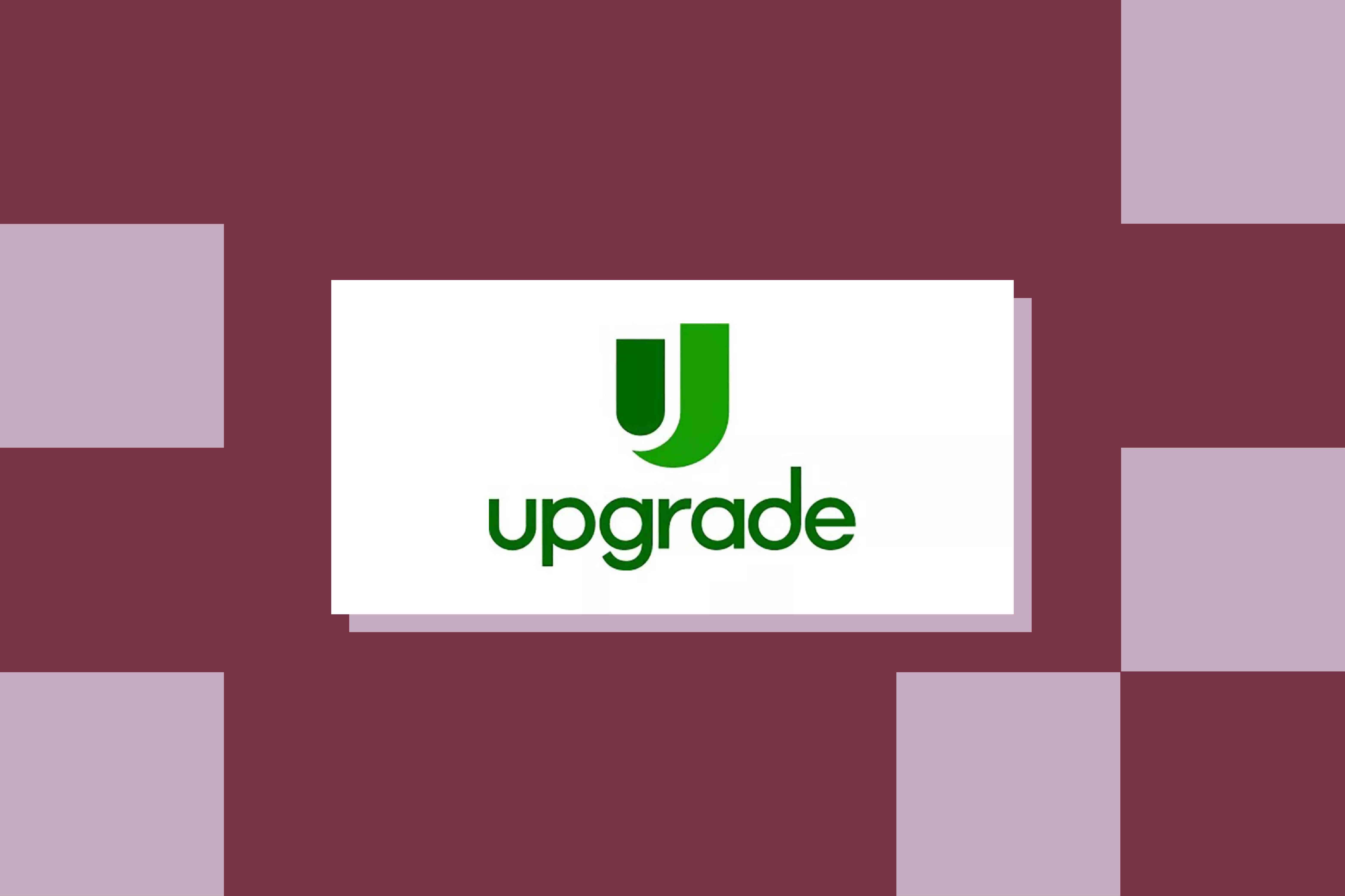 The Upgrade logo rests on a maroon and peach background.
