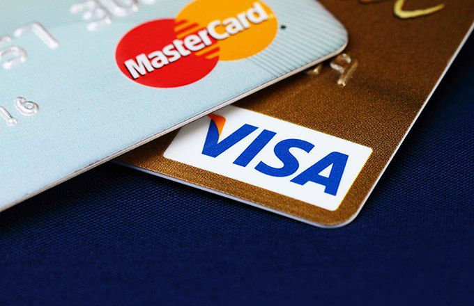 Close-up of Mastercard and Visa card logos