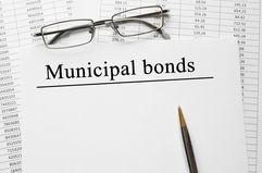 A paper with Municipal Bonds on a table.