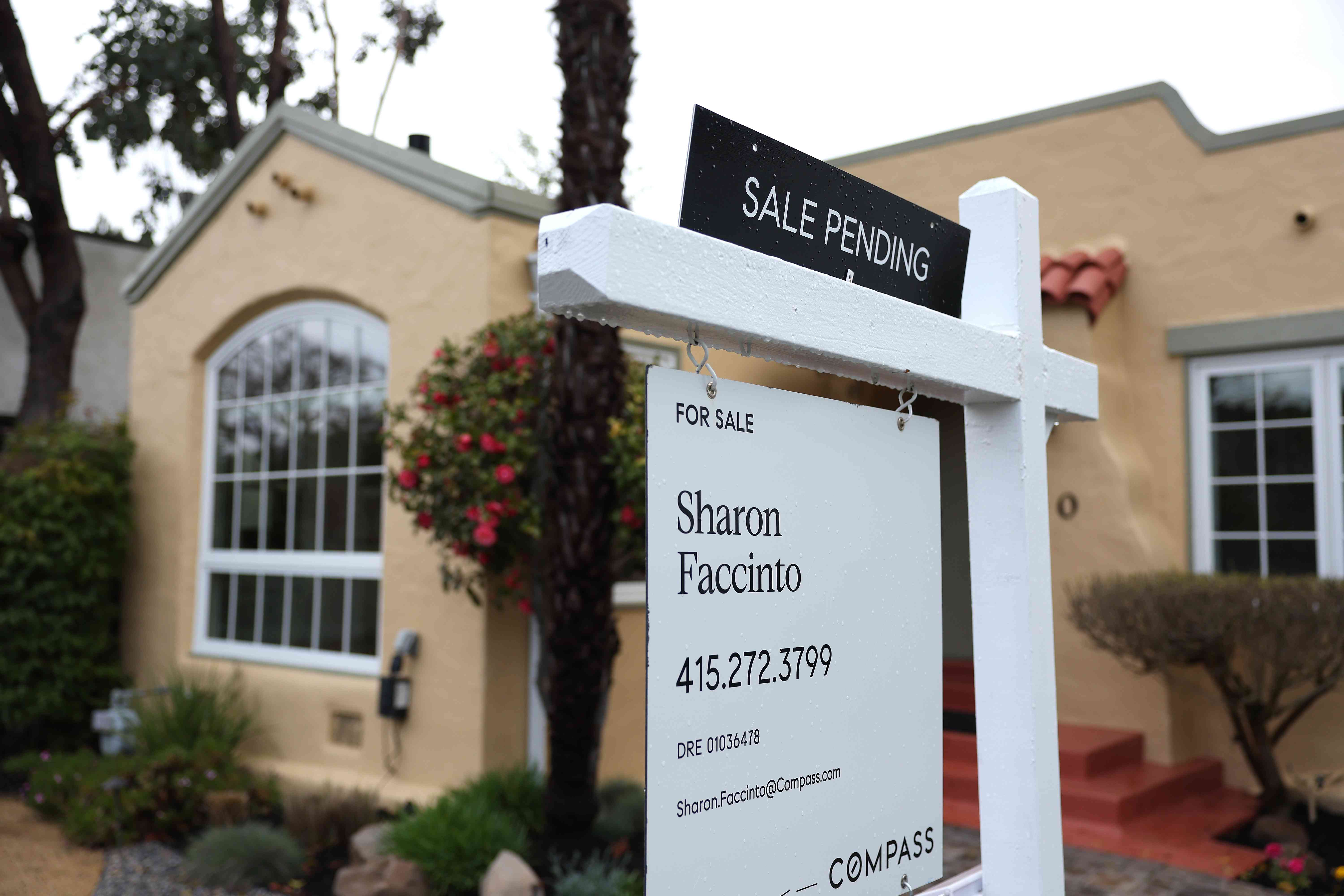 A for sale sign is posted in front of a home on March 22, 2023 in San Anselmo, California.