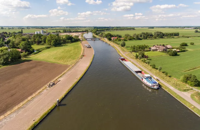 Aerial shot of the Merwede canal near the Arkel village located in the Netherlands.