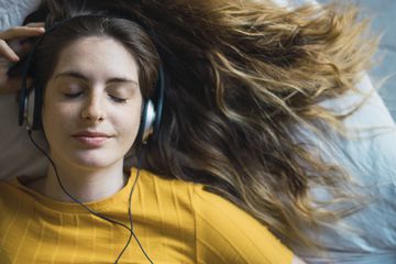 Woman listening to her headphones