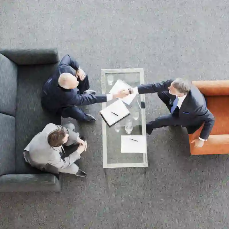 A bird's eye view of businessmen shaking hands