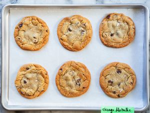 baked cookies on a piece of parchment paper on a sheet pan. 