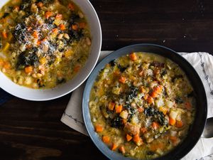 Overhead view of two bowls filled with ribollita soup.