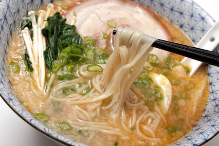 A bowl of ramen noodle soup; you can transform regular pasta into ramen noodles with baking soda.