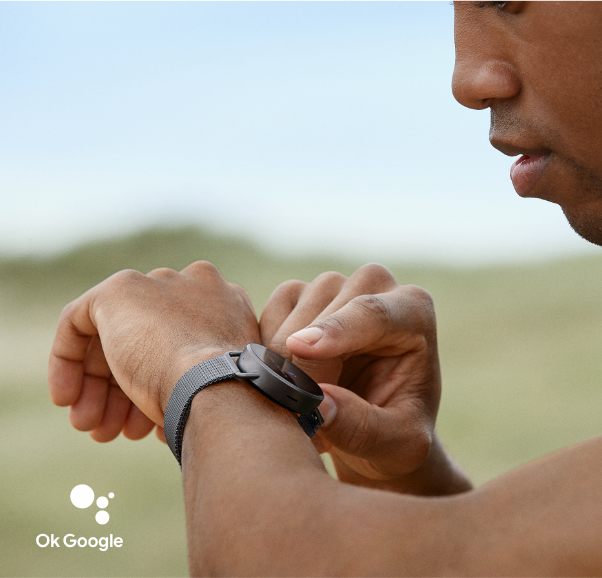 Image of man talking to his smartwatch.