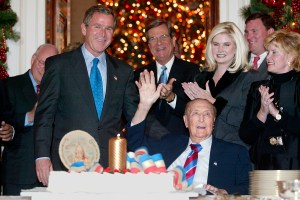 WASHINGTON, :  US Vice President Dick Cheney (L, background), US President George W. Bush (2nd L), Senator Trent Lott (C), R-MS, daughter Julie Thurmond-Whitmer (2nd R) and wife Nancy Thurmond (R) applaud Senator Strom Thurmond (foreground) as he celebrates his 100th birthday in the White House 06 December 2002 in Washington, DC. Bush held a reception for Thurmond, his family and his staff to celebrate the senator's milestone birthday.   AFP PHOTO/ Stephen JAFFE (Photo credit should read STEPHEN JAFFE/AFP via Getty Images)