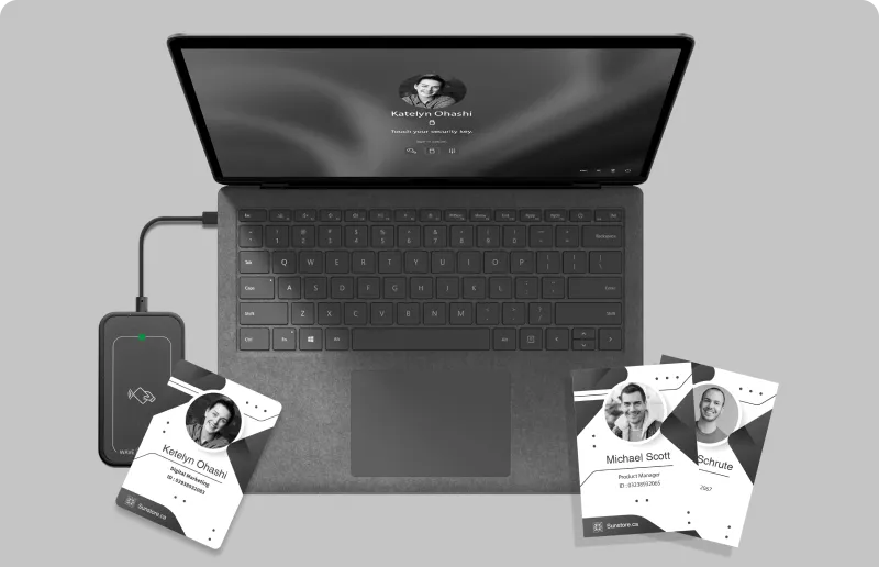 ID Badges, Phones, and a Laptop with Windows Login Screen