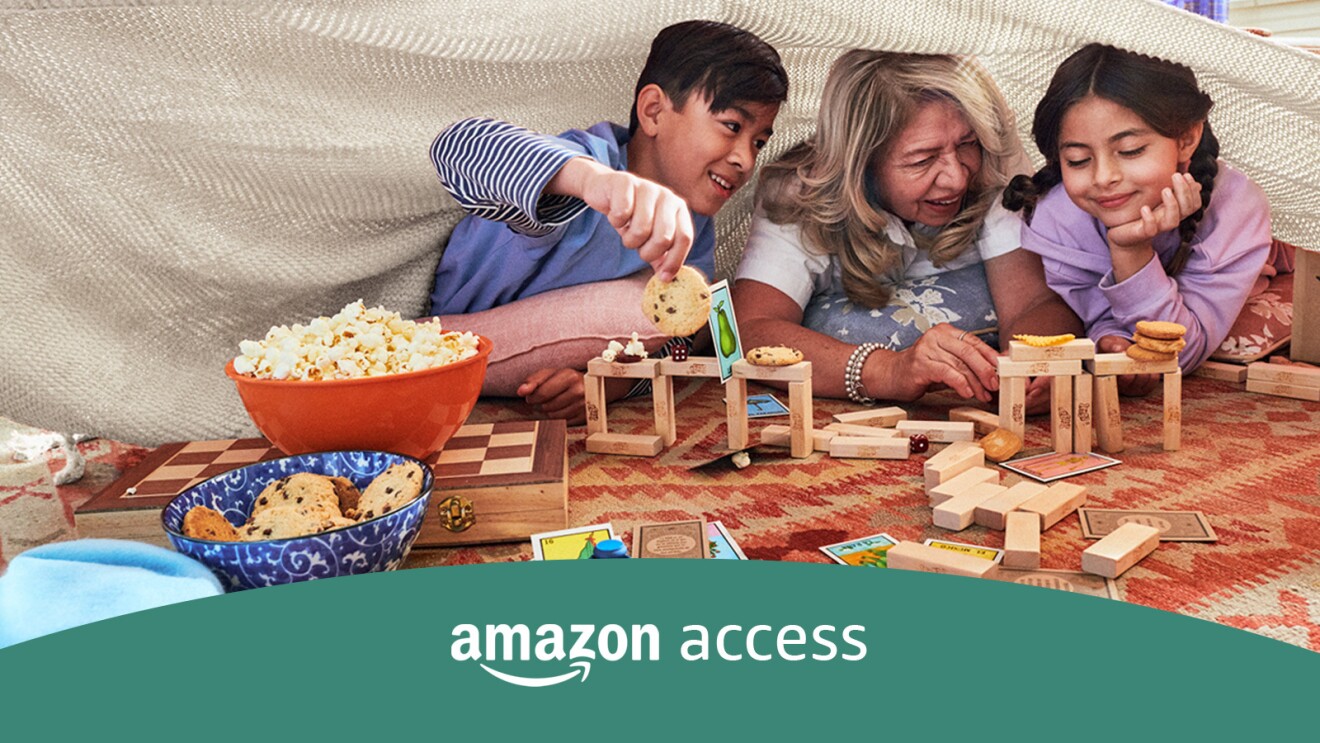An image of a family playing together. There is an overlay that says "Amazon Access"