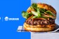 An image of a hamburger with text that reads: Prime GrubHub.