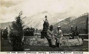 96-07-08-alb10-184, William and Grace McCarthy sitting near a fountain on the grounds of the Banff Springs Hotel, Canada, c. 1935