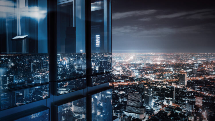 High rise building in city at night